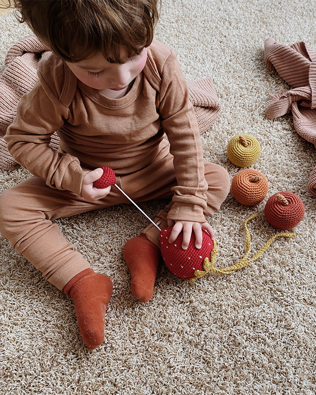 Patti Oslo Norge Strawberry Music Mobile | red Music Mobiles & Pram Chains